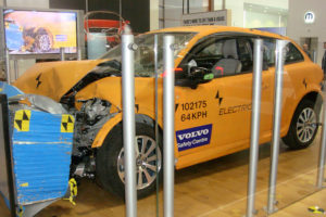 Yellow Volvo C30 electric during a crash test in safety center