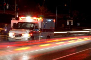 Ambulance vehicle on nightly road