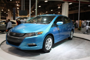 Blue Toyota Prius in showroom